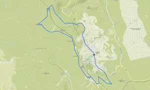 Mapa turystyczna okolic Polanicy Zdrój. Widoczne szlaki, wzniesienia (np. Zielony Garb 1026 m, Kamienny vrch 1037 m) i rezerwaty przyrody.