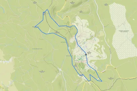 Mapa turystyczna okolic Polanicy Zdrój. Widoczne szlaki, wzniesienia (np. Zielony Garb 1026 m, Kamienny vrch 1037 m) i rezerwaty przyrody.