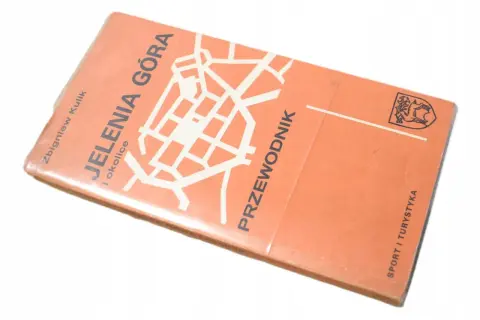 Przewodnik "Jelenia Góra co zobaczyć" autorstwa Zbigniewa Kulika. Na okładce mapa miasta i herb.