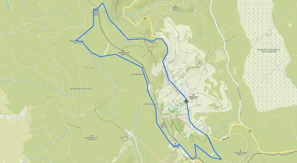 Mapa turystyczna okolic Polanicy Zdrój. Widoczne szlaki, wzniesienia (np. Zielony Garb 1026 m, Kamienny vrch 1037 m) i rezerwaty przyrody.